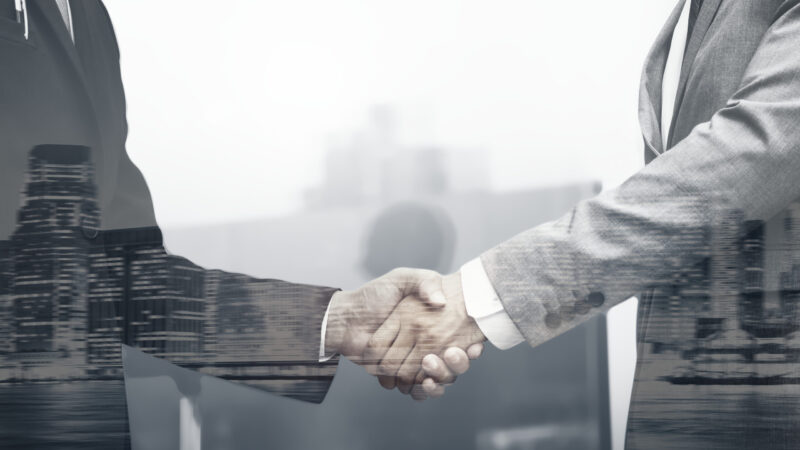 Business partners handshake international business concept